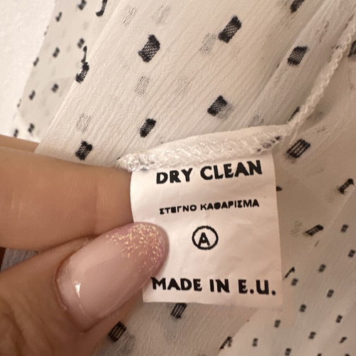 White wrap top with subtle polka dot pattern, like new