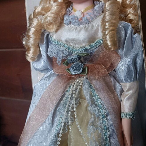 Porcelain doll with stand new, vintage style