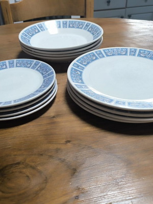 Keramikos vintage set of 12 ceramic plates with blue folk motif