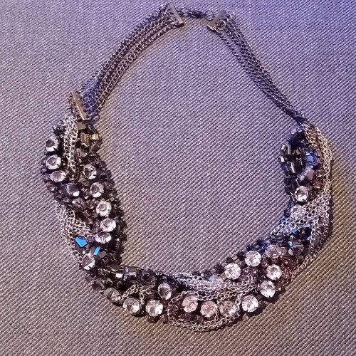 Fashion jewelry necklace in silver tones like new