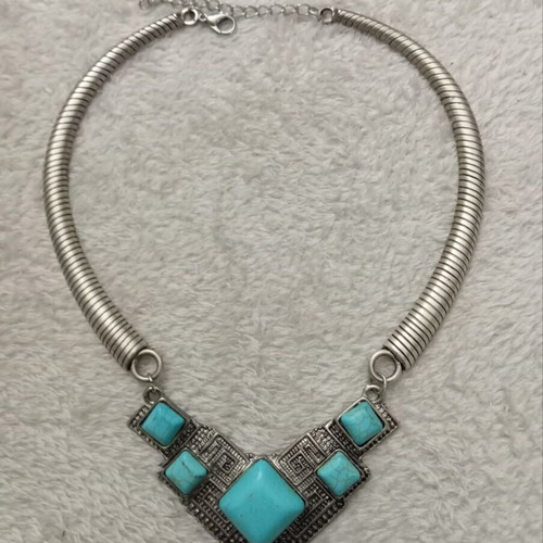Silver necklace like new with blue stone