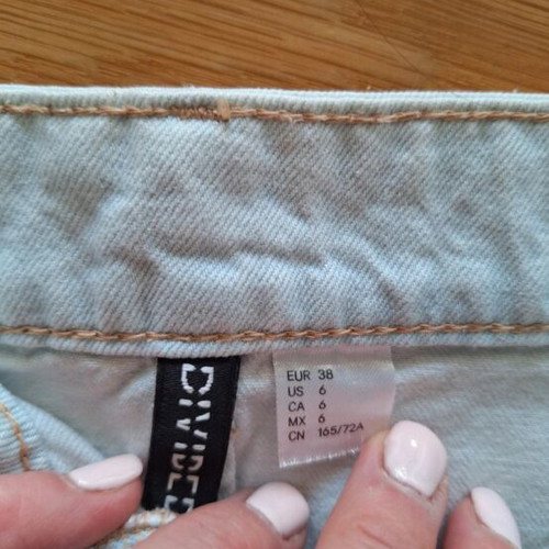 H&M denim skirt like new with small rips, blue, size M