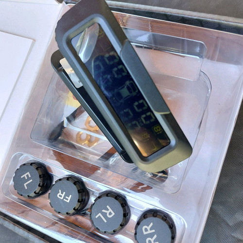 Wireless tire pressure and temperature monitoring system new