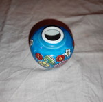 Small blue vase with porcelain flowers used