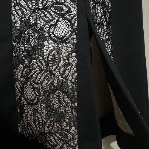 Evening dress knee-length black with sewn lace on champagne fabric like new