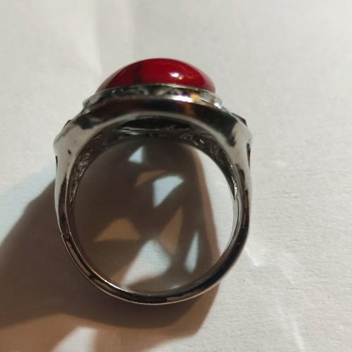 Silver-plated ring with red stone and small crystals new