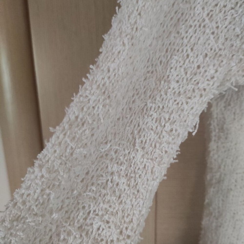 Transparent blouse used, white knitted