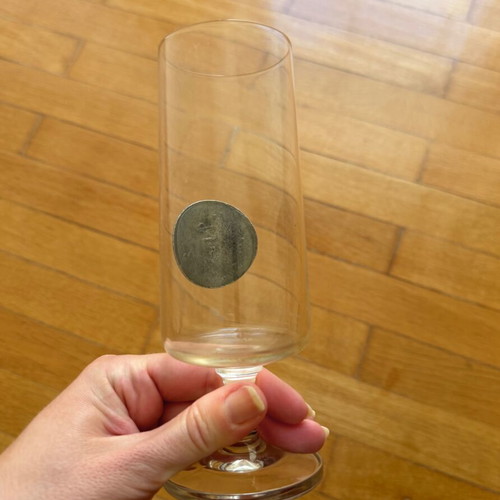 Drink glass with coin like new, collectible crystal stemmed