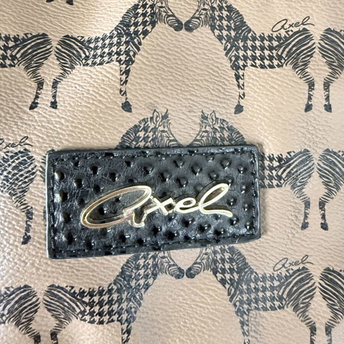 Axel travel bag like new, black and beige