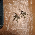 Marijuana dangle earrings unused