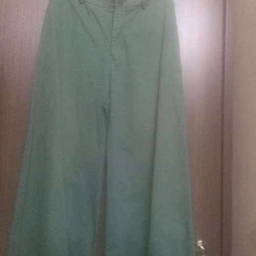 Pants with wide cuff, zipper and button front like new