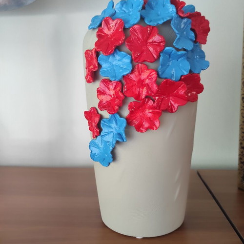 Handmade ceramic vase with 3D floral decoration