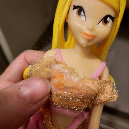 Winx doll used with slightly torn top