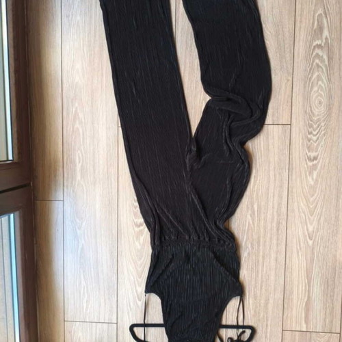 Pink Woman black halterneck jumpsuit size small like new