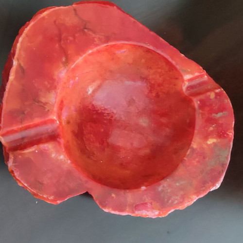 Large ashtray used red with veins