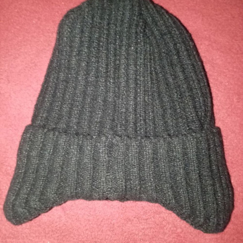 Black hat with ear coverage and fur lining new