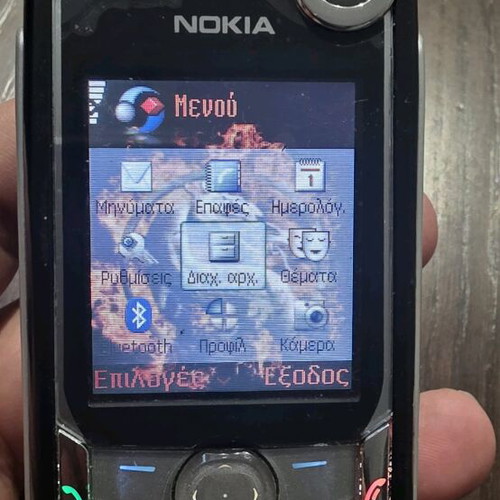 Nokia 6680 like new with original headphones without battery