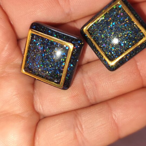 Handmade geometric earrings with blue glitter resin