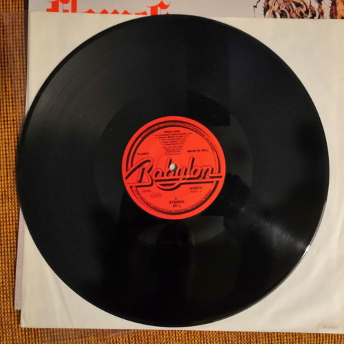 Flames Made in Hell and Greatest Hits vinyls used, metal