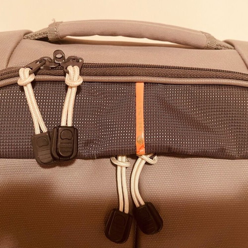 Delsey toiletry bag like new, gray with 2 compartments and shoulder strap