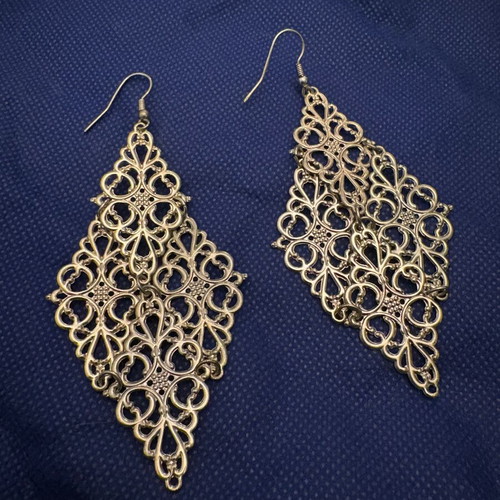 Boho earrings in gold color like new