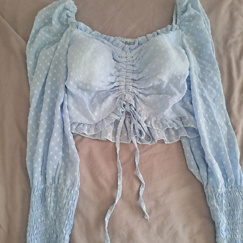 Luigi blue top like new with unique sleeves and bust ties