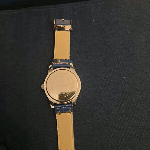 Women's watch like new with blue strap and metal case