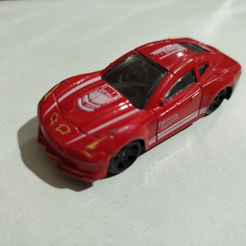 Red toy car used in very good condition