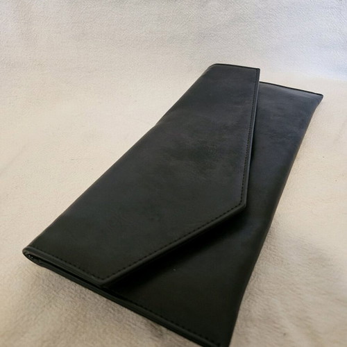 Black envelope bag made of synthetic leather like new