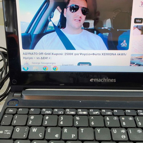 eMachines eM355 netbook 10.1" like new with charger