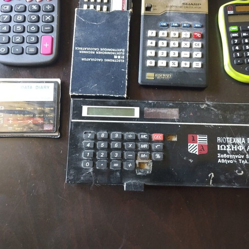 Vintage calculators and electronic organizers used, pack of 12