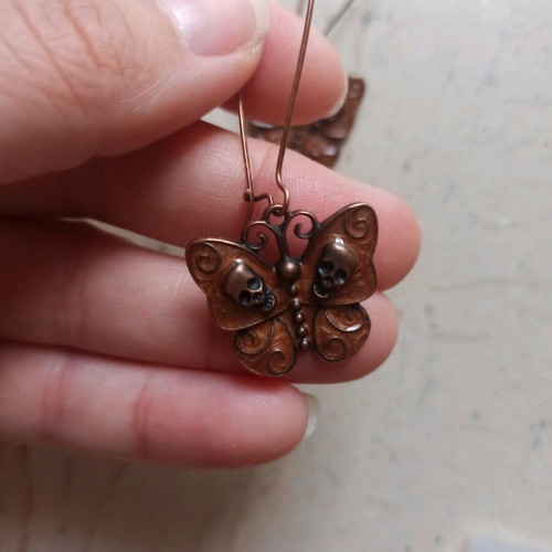 Handmade metal butterfly and skull earrings new, brown
