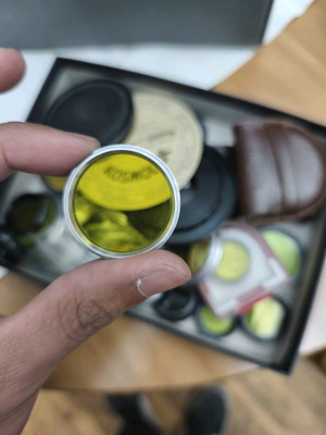 Vintage lenses and filters for cameras like new, all together