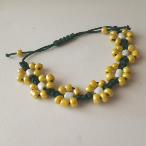 Handmade beaded bracelet with flower design, new, green and yellow