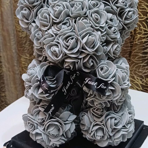 Teddy bear made of artificial roses in gift box new, gray