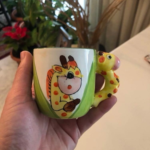 Mug like new with giraffe design