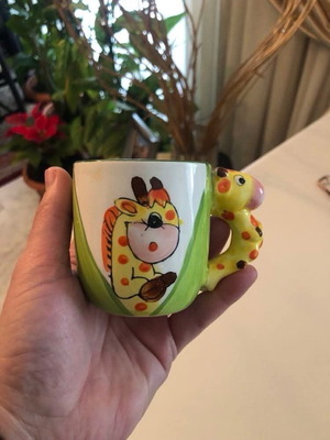 Mug like new with giraffe design