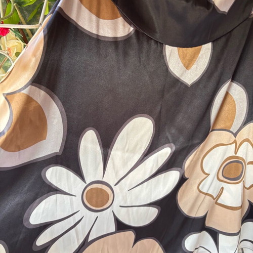 Women's skirt knee-length, airy, flared, like new, with large floral print