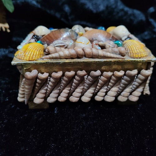 Vintage jewelry box with natural sea shells and royal velvet