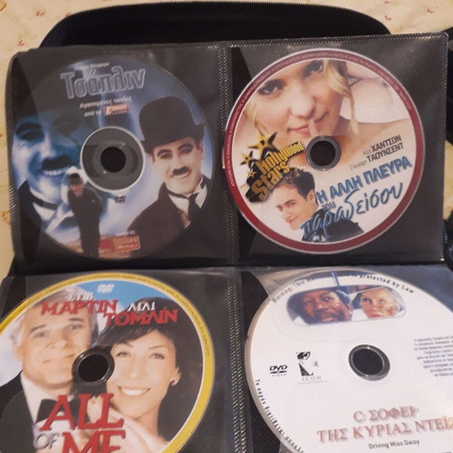 DVD collection like new, 150 discs with movies and documentaries