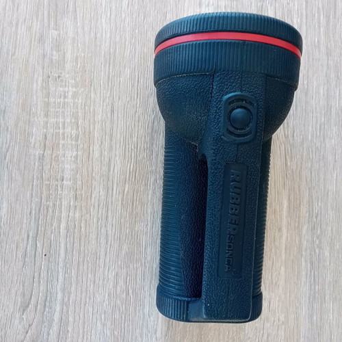 Handheld flashlight used