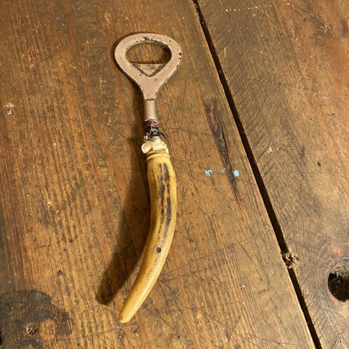 Vintage bottle opener used, height 16.5 cm