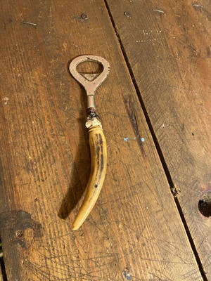 Vintage bottle opener used, height 16.5 cm