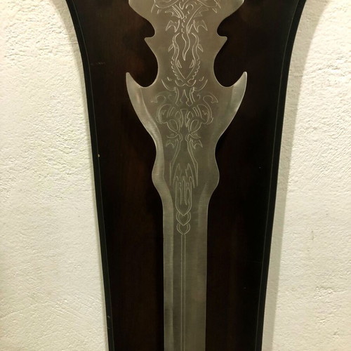 Decorative sword used on wooden wall mount with stainless steel blade