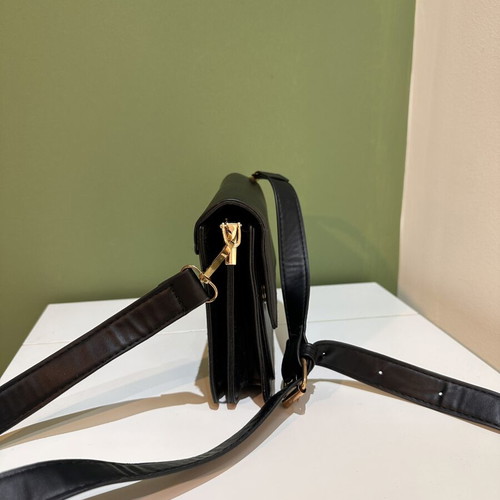 Black women's crossbody shoulder bag with gold details