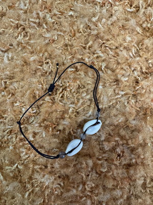 Bracelet with shells like new, black and white