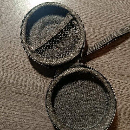 Small round black case like new with clip