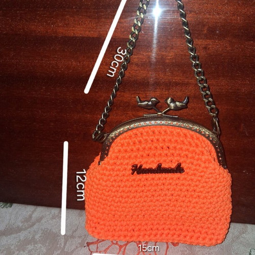 Knitted handbag new, orange color