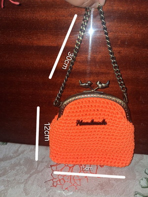 Knitted handbag new, orange color