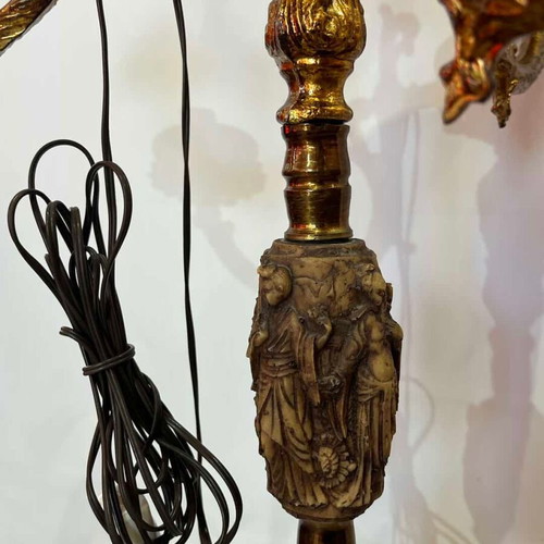 Vintage brass floor lamp with ornate baroque designs used